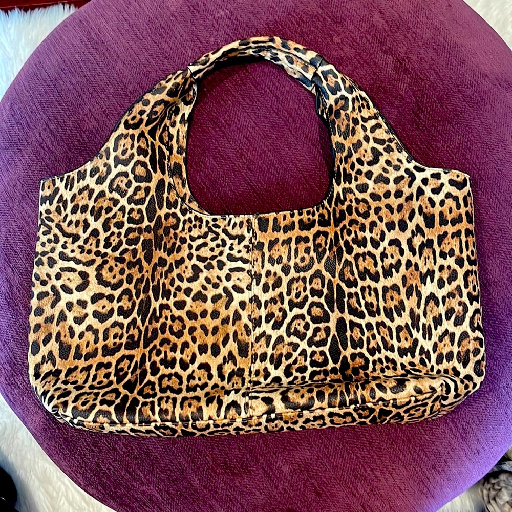 Ahdorned animal print tote